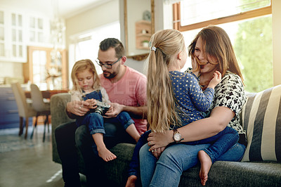 Buy stock photo Care, family time and parents with kids in living room for bonding, play together and cozy weekend morning. Trust, loving man and woman with children in home for support, happiness and relationship.