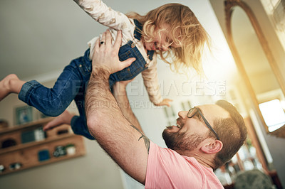 Buy stock photo Airplane, smile and father with daughter on sofa for flying games, bonding and love. Happiness, connection and balance with man and child in living room of family home for trust, growth and flare