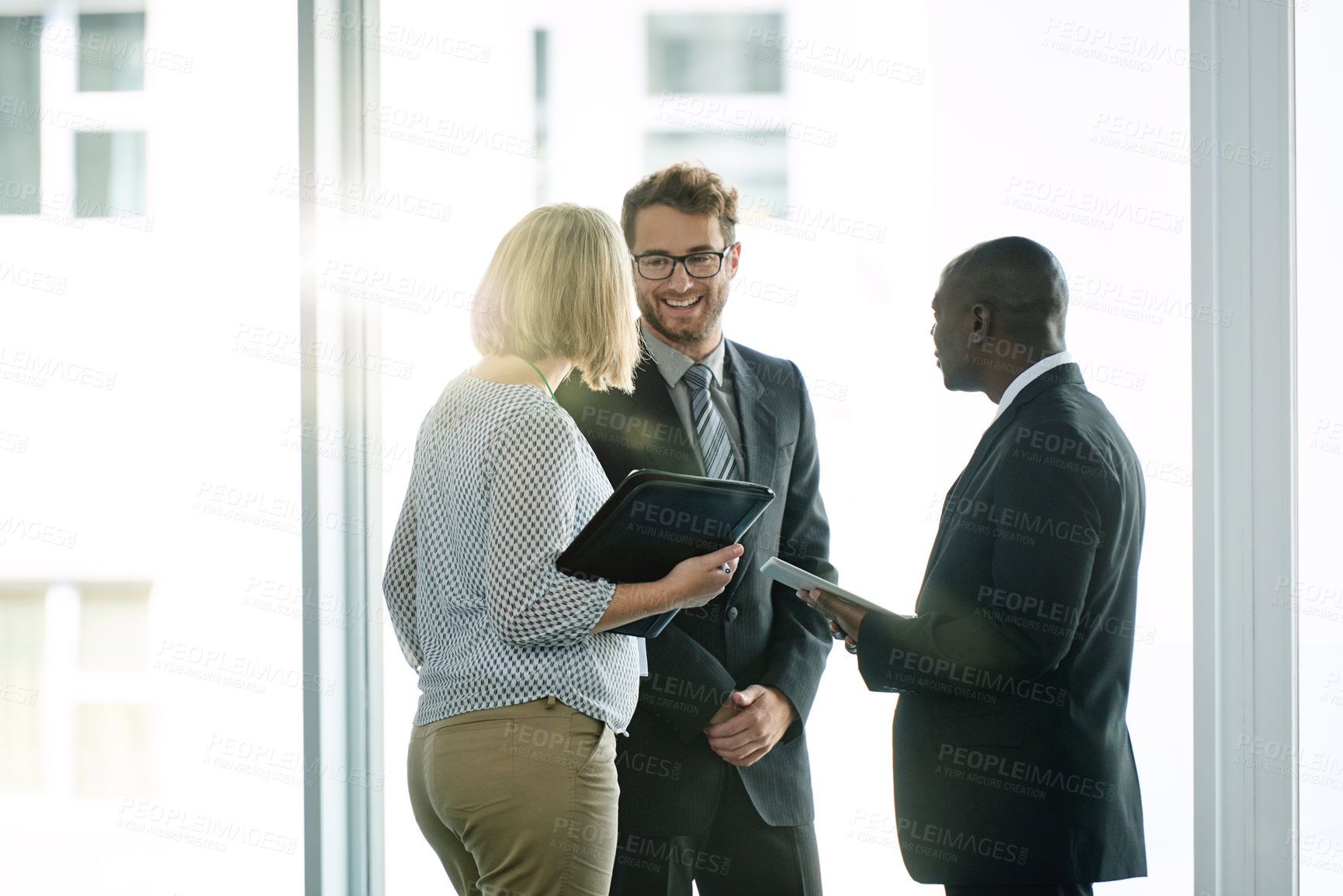 Buy stock photo Teamwork, meeting and smile with business people in office for trading advice, partnership or investor. Stock market advisor, broker collaboration and feedback with employees in agency for discussion