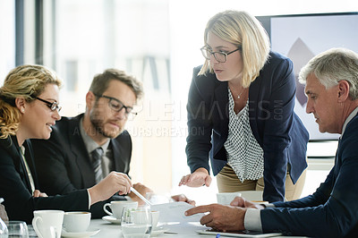 Buy stock photo Meeting, documents and team with business woman in office for financial review, audit data and report. Budget performance, treasury account and paperwork with employees in agency for investing profit