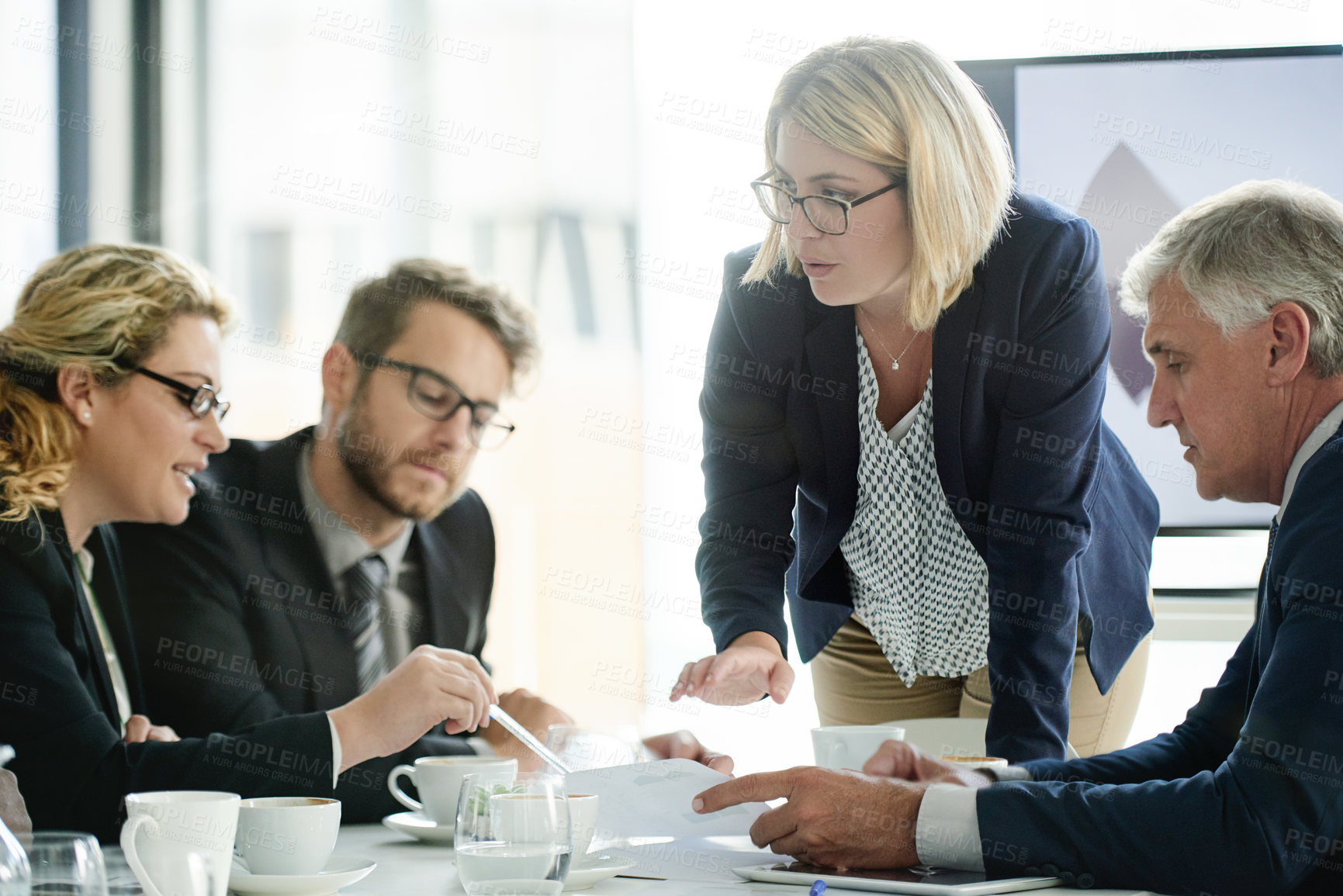 Buy stock photo Meeting, documents and team with business woman in office for financial review, audit data and report. Budget performance, treasury account and paperwork with employees in agency for investing profit