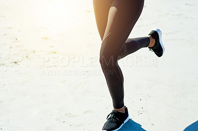 Buy stock photo Exercise, legs and running with athlete on beach for cardio training, morning workout or speed. Feet, fitness and space with woman runner on sand for challenge, health or physical improvement
