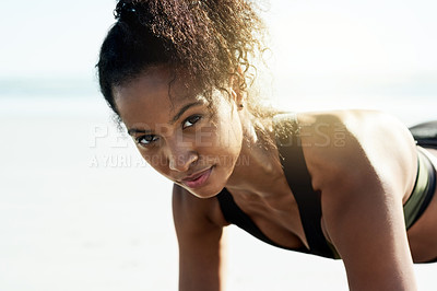 Buy stock photo Push up, portrait and workout with woman on beach for balance, power or physical challenge. Exercise, fitness and space with strong African athlete on blue sky for improvement or strength training