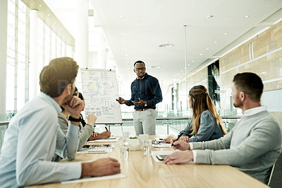 Buy stock photo Boardroom, presentation and man with team, meeting or speaker with whiteboard, group and discussion. Business, presenter and training session for people, sales manager and planning with colleagues
