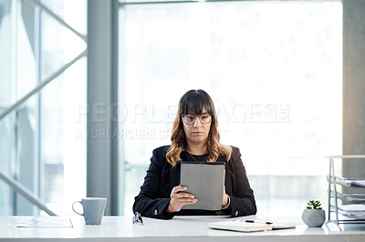 Buy stock photo Reading, space and businesswoman on tablet in office for online report, finance and audit. Window, review or banker on touchscreen in financial agency for equity, stock news and investment growth
