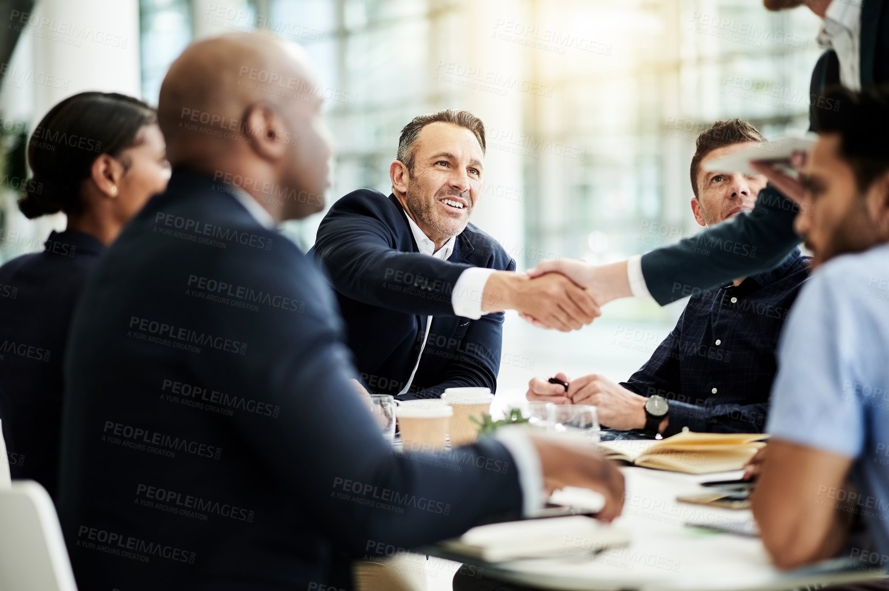 Buy stock photo Happy, business people or meeting with handshake in office for project agreement or B2B. Group, employees or shaking hands with smile or hiring for team recruitment, deal or introduction in workplace