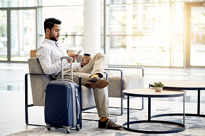 Buy stock photo Relax, employee and man with smartphone, airport or communication for travel plan or schedule on web. Scroll, online and person with coffee for international trip, suitcase and check booking details