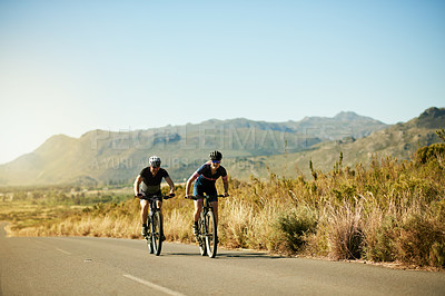 Buy stock photo Exercise, cycling and couple with bicycle outdoor for sports, fitness and workout together. Bike, man and woman on road for training, cardio challenge and travel in countryside with mockup space