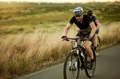 Buy stock photo Cycling, road and couple with bicycle outdoor for hobby, training and fitness in nature for race. Sports, trip and woman with man on bike with helmet for exercise, journey or challenge in countryside