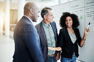 Buy stock photo Business, team and people with meeting at whiteboard for marketing launch, workflow and planning. Employees, collaboration and discussion in office for campaign briefing, project management or update