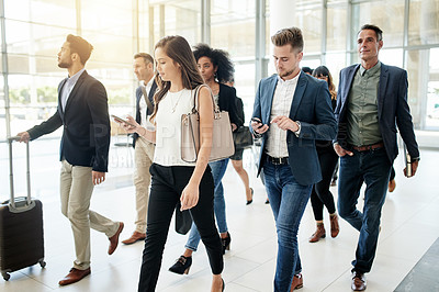 Buy stock photo Business people, walking and travel with team in corporate building for company immigration. Group, staff or employees moving together with luggage for new career, job opportunity or relocation