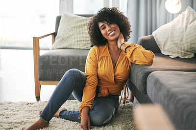 Buy stock photo Happy woman, portrait and relax on floor in living room, comfort and pride by sofa at apartment. Girl, smile and chill on carpet, confident and weekend for rest in lounge at house in Costa Rica