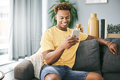 Buy stock photo Relax, sofa and black man with phone for online chatting, social media and message notification. Happy, typing and person on smartphone for connection, website and networking on mobile app in home