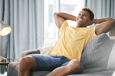 Buy stock photo Stretching, man and calm on couch, home or stress relief in lounge, happiness or relax in apartment. Think, African person or comfortable on sofa, positive mindset and rest on weekend, smile or break