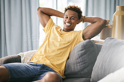 Buy stock photo Relax, student and portrait of black man on sofa for chilling, rest and comfortable on weekend. Happy, home and person on couch for school break, vacation and free time with smile, wellness and peace
