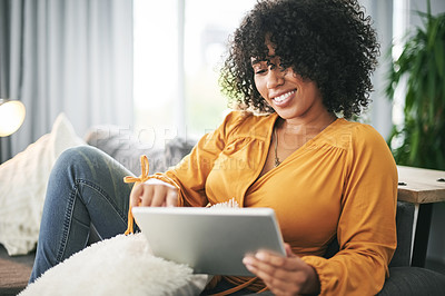 Buy stock photo Relax, smile and tablet with woman on sofa in living room of home for download, post or update. App, internet and social media with happy African person in apartment to rest on weekend for me time