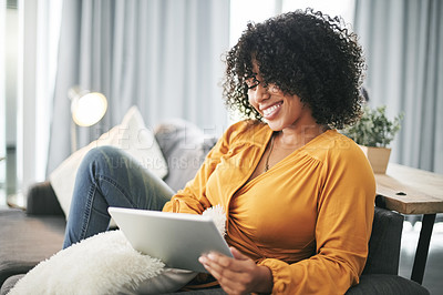 Buy stock photo Break, smile and tablet with woman on sofa in living room of home for download, post or update. App, relax and social media with happy African person in apartment to rest on weekend for me time