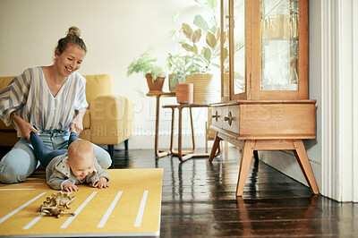 Buy stock photo Family, play and mother and baby with toys in home for bonding, quality time and relax together. Living room, love and happy mom with kid playing for child development, care and happiness on weekend