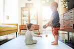 Baby, living room and children play with toys for bonding, quality time and child development at home. Family, siblings and kids playing with building blocks for learning, educational games and fun