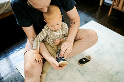 Buy stock photo Dressing, shoes and father with baby in living room for ready, morning routine and clothes. Bonding, support and help with man and young child in family home for happy, change and learning
