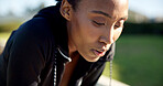 Fitness, exercise and tired runner outdoor for fatigue, intense and rest on break on run in park. Breathe, exhausted and black woman with healthy lifestyle, training and cardio workout for wellness