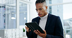 Businessman, reading and online in office with tablet, check email and daily admin for finance job. African person, browsing and tech in workplace for digital schedule, financial report and review.