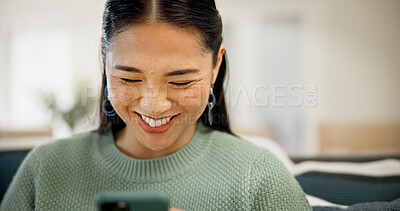 Buy stock photo Smile, phone and woman in home with social media, download app or forum communication on internet. Mobile, Asian person and text message in lounge, chat notification or like post with subscription