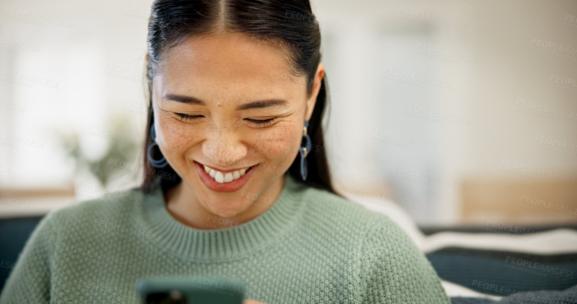 Buy stock photo Smile, phone and woman in home with social media, download app or forum communication on internet. Mobile, Asian person and text message in lounge, chat notification or like post with subscription
