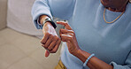 Hands, senior and check smart watch in home for health vitals, track wellness or medication reminder. Pensioner, person and wristwatch with tracking, heart rate and daily step count for healthy aging