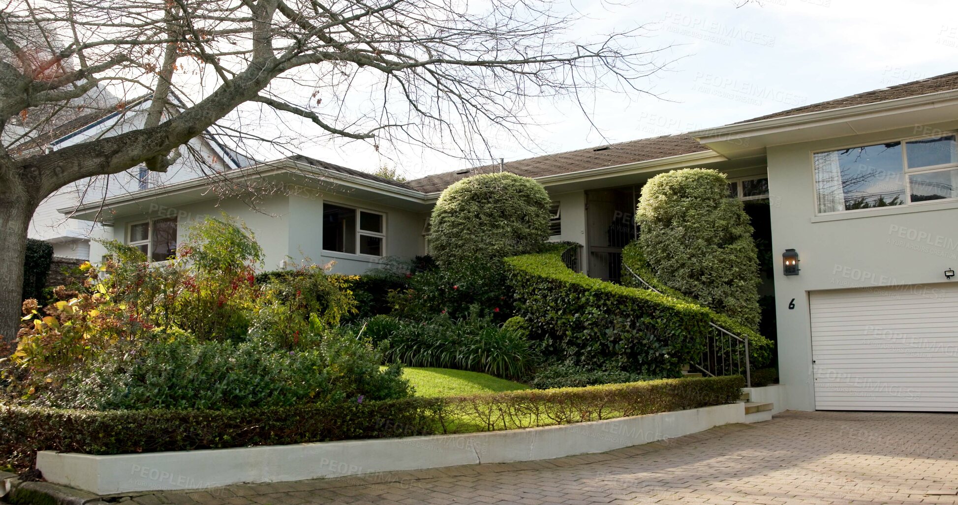 Buy stock photo Real estate, house and property facade for sale in neighborhood, mortgage and loan at garden. Building exterior, modern home and residential housing investment, front yard and wallpaper outdoor