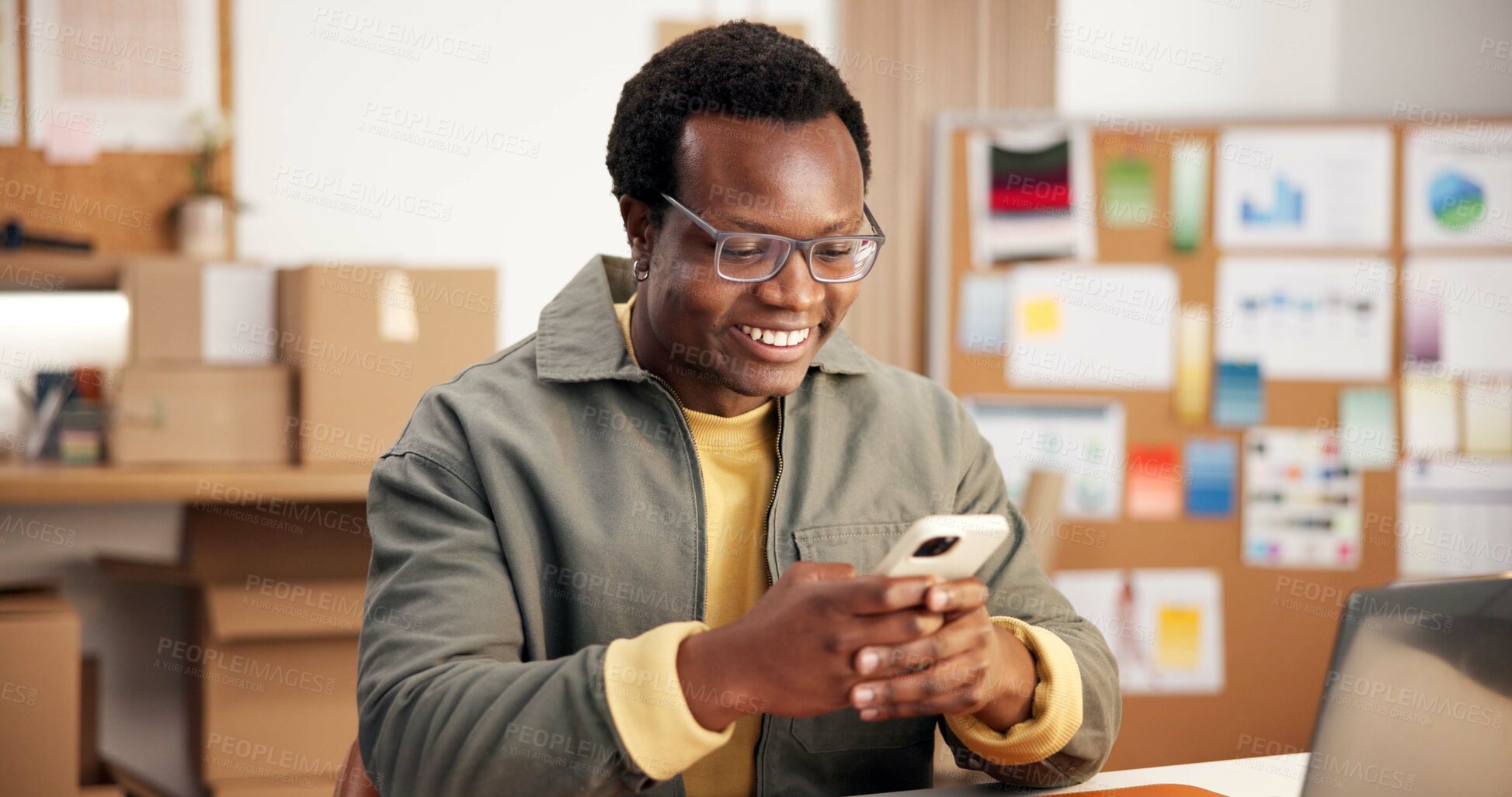 Buy stock photo Logistics, small business and happy man with phone, texting and delivery update on social media app. Typing, message and black person with mobile, shipping and communication with contact in startup