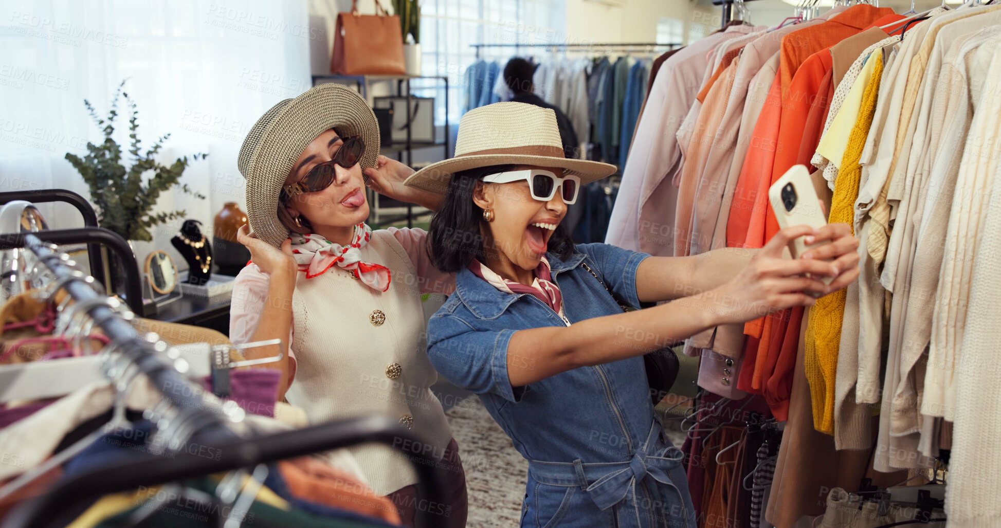 Buy stock photo Friends, selfie and happy women with hat in shopping mall, post or profile picture for social media. Fashion, photography and people with tongue out, laughing and content creation with sunglasses