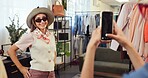 Friends, photo and women in store for shopping, bonding and memory for social media in retail mall. Happy, influencer and people with phone for picture, update and promotion post for fashion discount