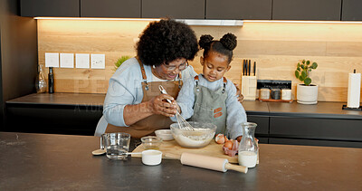 Buy stock photo Grandmother, child and baking with whisk, teaching and support with black family in kitchen. Girl, grandma and mix ingredients in bowl for help with guidance, smile or learning cooking at house