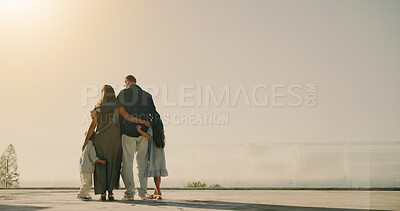 Buy stock photo Outdoor, back and parents with children for hug, bonding or support on summer vacation with space. Married couple, kids or together at hotel for healthy family dynamic, travel holiday or balcony view