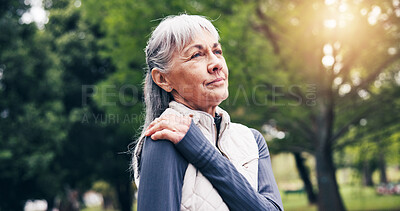 Buy stock photo Senior, woman and fitness with shoulder pain in park for outdoor injury or accident in nature. Active, elderly or female person or sore arm for discomfort, muscle tension or fibromyalgia in forest