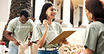 Clipboard, volunteer and happy woman with team for outreach, checklist or charity campaign. Female person, activist or community service with smile for NGO, outdoor fundraiser or donation together