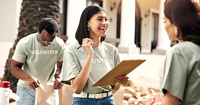 Buy stock photo Clipboard, volunteer and happy woman with team for outreach, checklist or charity campaign. Female person, activist or community service with smile for NGO, outdoor fundraiser or donation together