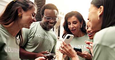 Buy stock photo Volunteer, group or smile outdoor with phone, bts charity video or social interaction on team break. NGO, happy people or show mobile for donation progress, fundraising event post or bonding together