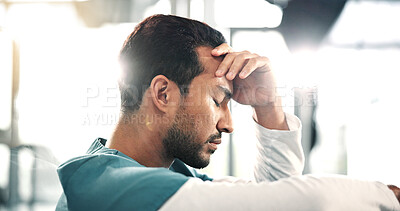 Buy stock photo Nurse, man and tired in hospital with healthcare burnout, shift workload and sleep deprivation. Exhausted, worker and break in clinic for medical fatigue, overworked and clinical pressure with flare