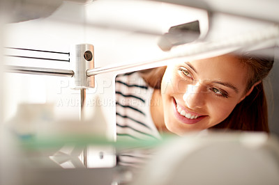 Buy stock photo 3D printer, creative and smile of designer woman in office for manufacturing or production. Business, process and technology with happy design professional in workplace for assembly or prototype