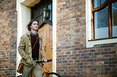 Buy stock photo Outdoor, walking and man with bicycle in commute for sustainable travel or journey in town. Thinking, morning and person with bike for eco friendly transportation on urban sidewalk street in city