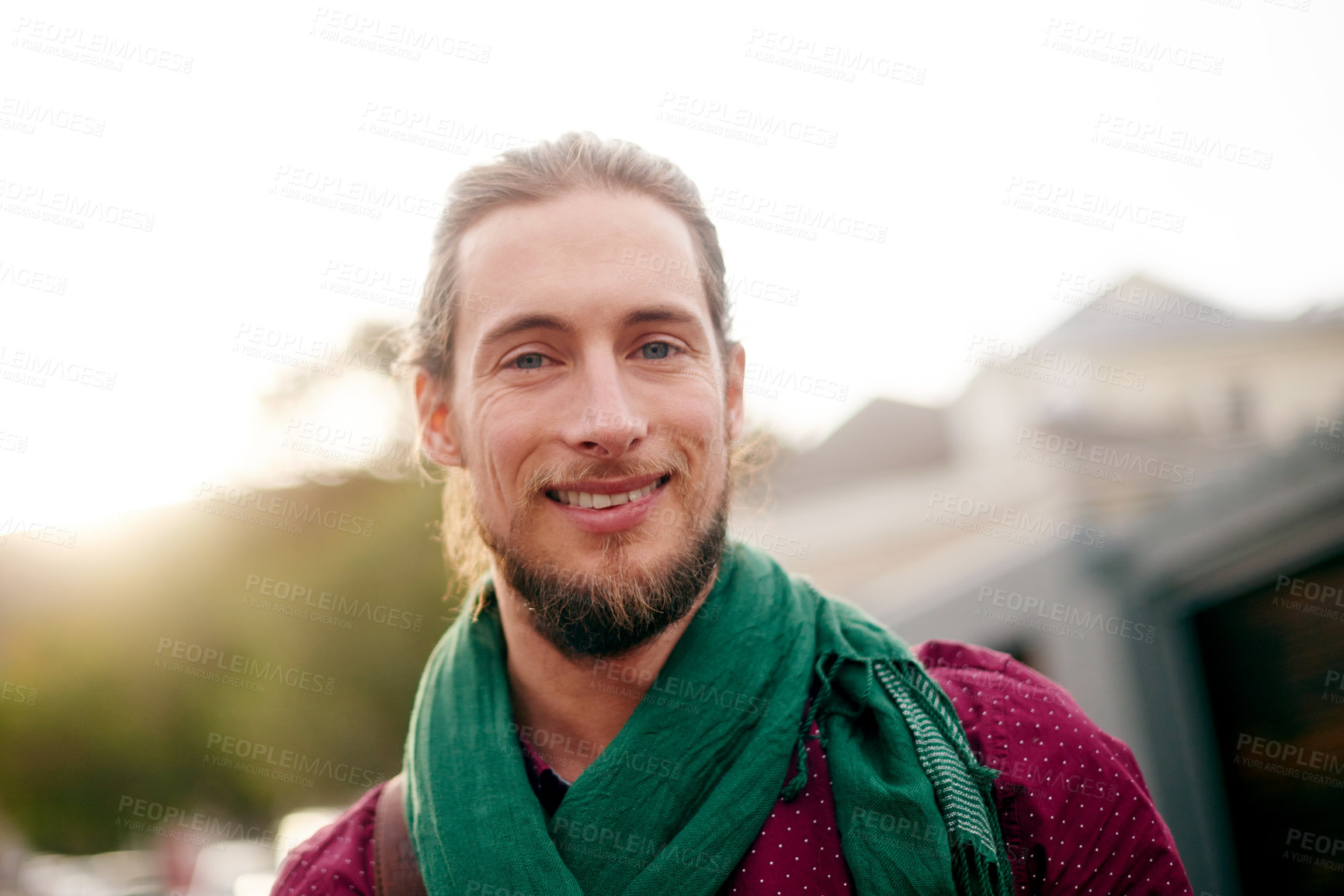 Buy stock photo Portrait, travel and man with smile in urban town for holiday adventure, vacation or discovery. Proud, outdoor trip or happy male tourist in city for tourism, commute or confidence to explore abroad