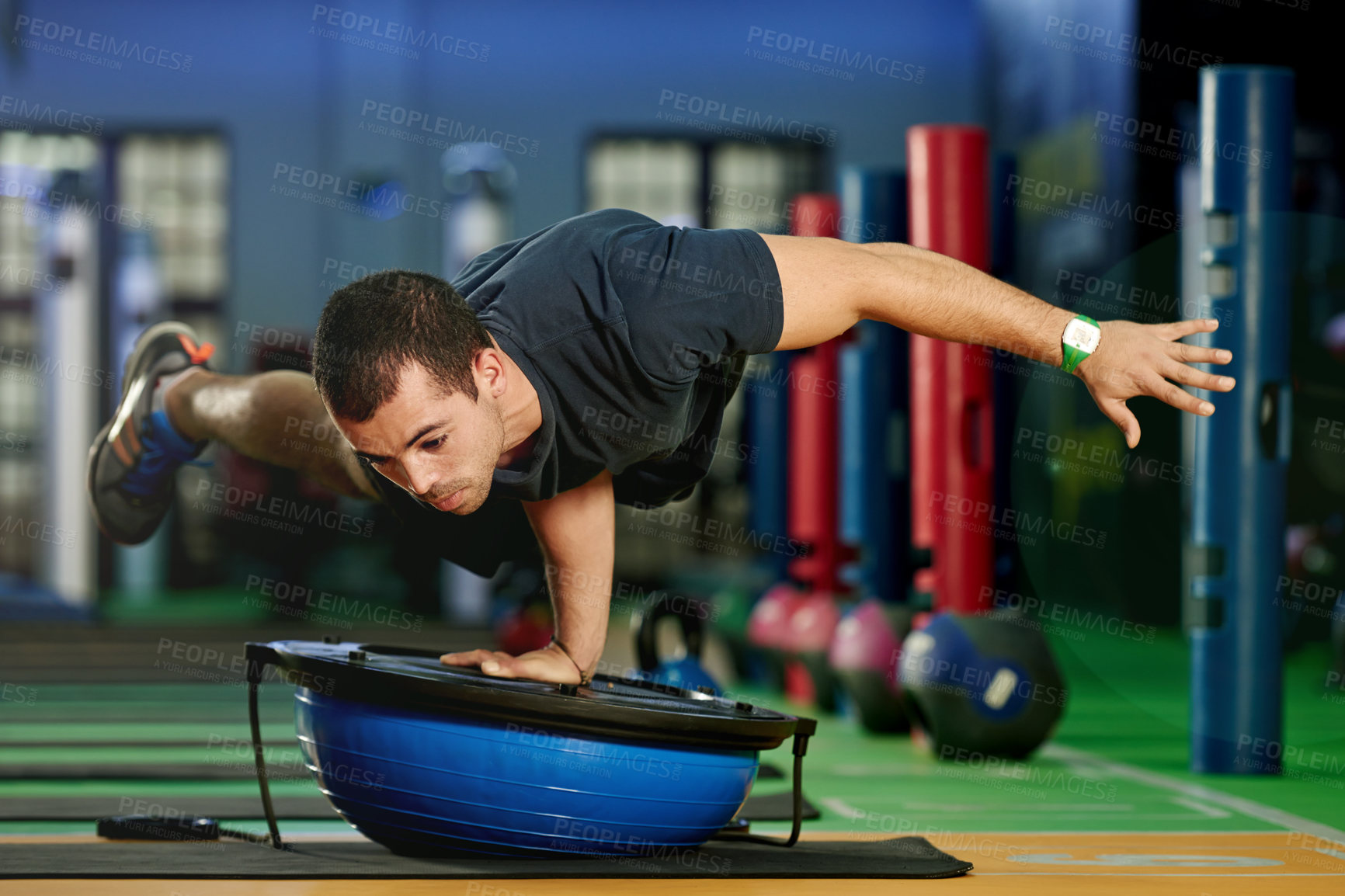 Buy stock photo Gym, balance or man with half ball in fitness for calisthenics practice, training or workout. Athletes, flexible or strong gymnast in club with stability trainer for athletics, acrobatics or exercise