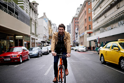 Buy stock photo Happy, man and travel with bicycle in city for morning commute, eco friendly transport or ride to work. Professional, person or cycling in road for sustainable trip, urban journey or carbon footprint