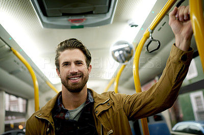 Buy stock photo Portrait, bus and man with smile, travel and public transportation with city service. Face, morning commute or passenger with handrail, safety or relax with urban journey, ride destination or trip