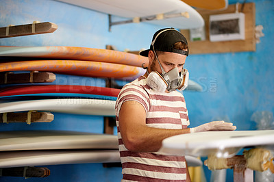 Buy stock photo Mask, PPE and man with surfboard, repair and creative for skills, talent and hobby. Craftsman, artist and entrepreneur with workshop for design, manufacturing and custom work for artisan craft