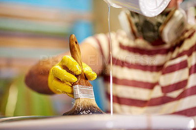 Buy stock photo Hand, surfboard and painting in workshop for creative process or pour clear coat on deck. Surfing, manufacturing or person with brush for art, design or craftsmanship with tools in production factory