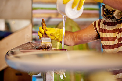 Buy stock photo Hand, surfboard and painting in workshop for production process, clear coat or pour paint. Surfing, manufacturing and person with brush for art, design or creative craftsmanship with tools in factory