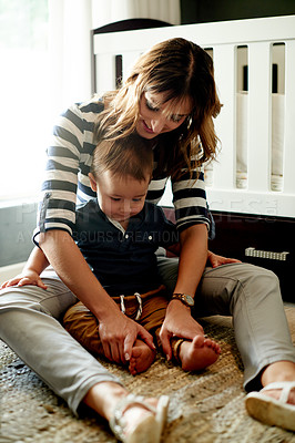 Buy stock photo Mother, toddler and relax in nursery in family home, bonding and relationship growth with motherhood. Love, care and playing together in bedroom, parenting and woman with boy kid at house with smile